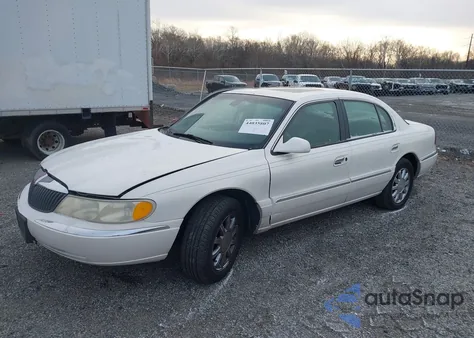 2002 Lincoln Continental z USA, uszkodzony, nr VIN 1LNHM97V52Y678644